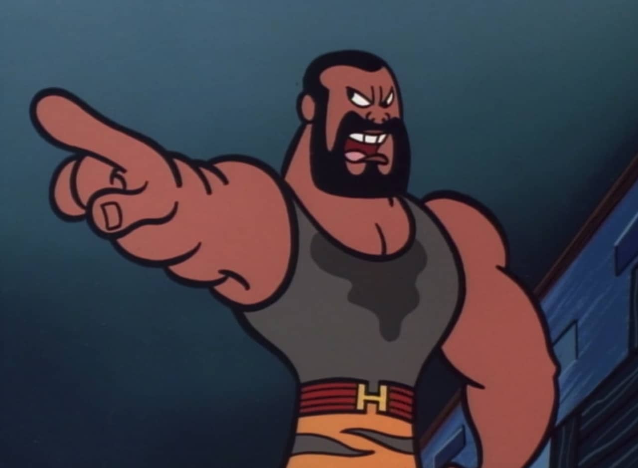 Action Hank, a buff black man with a cool beard