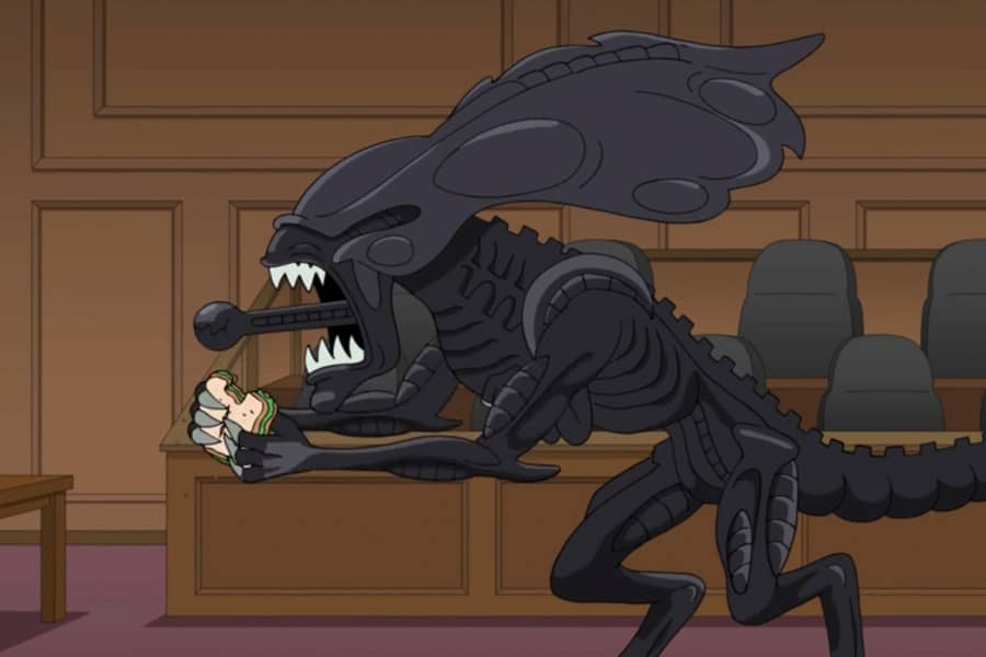 Xenomorph and his little mouth guy eat a sandwich