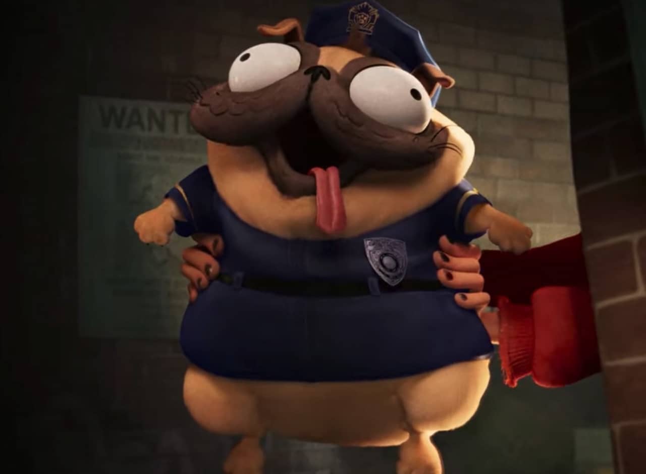 arms hold up a goofy pug dressed in a cop’s uniform
