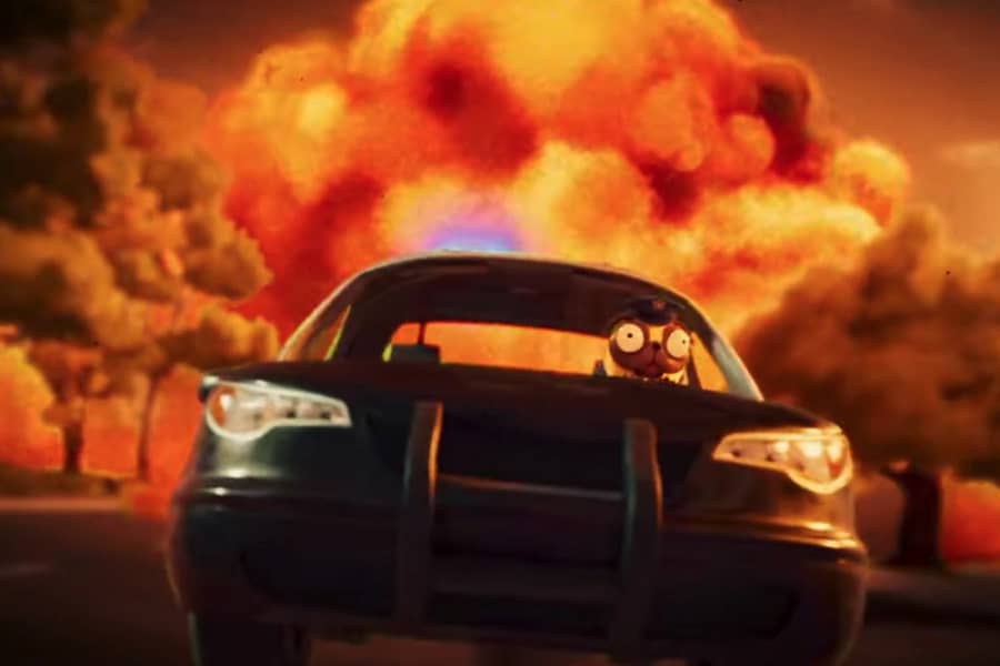 the pug drives a car away from an explosion