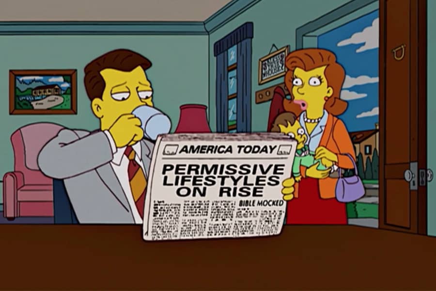 Mr. Thompson drinks coffee and reads a newspaper with headline “Permissive lifestyles on rise” with his concerned wife nearby