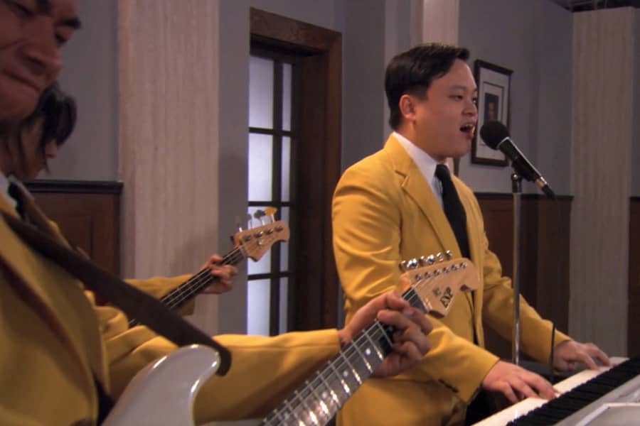 William Hung plays keyboard and sings with his band