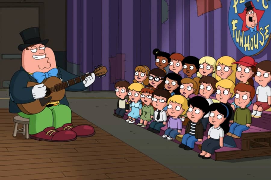 Peter plays guitar for the kids
