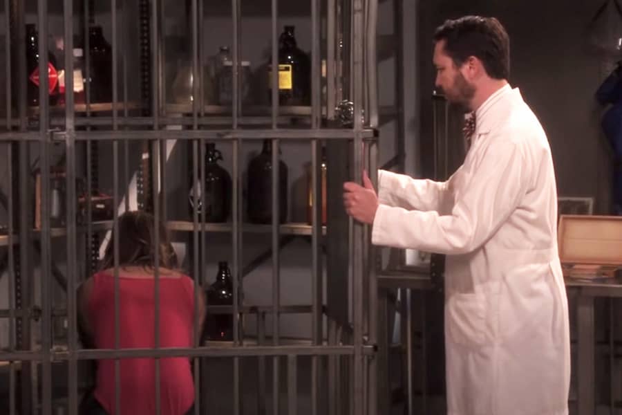 Wil Wheaton as a scientist talking to Penny in her cage