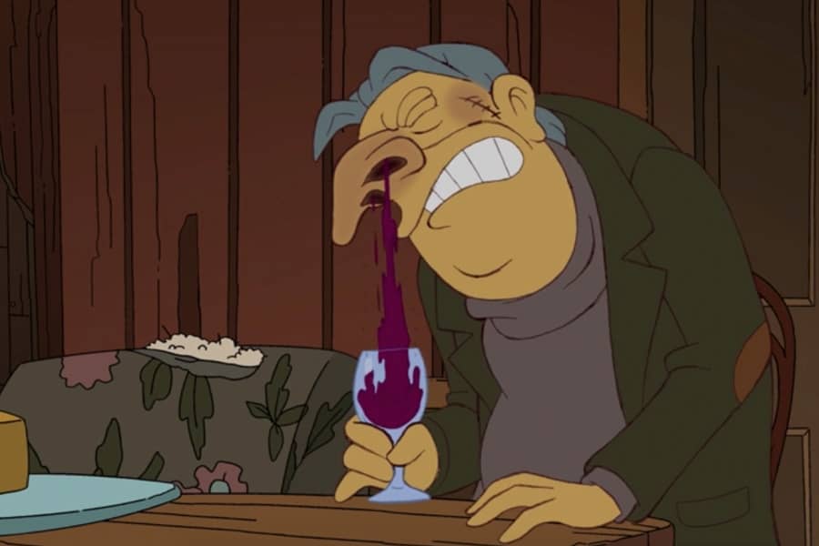 another man shoots wine out of his nose into a glass