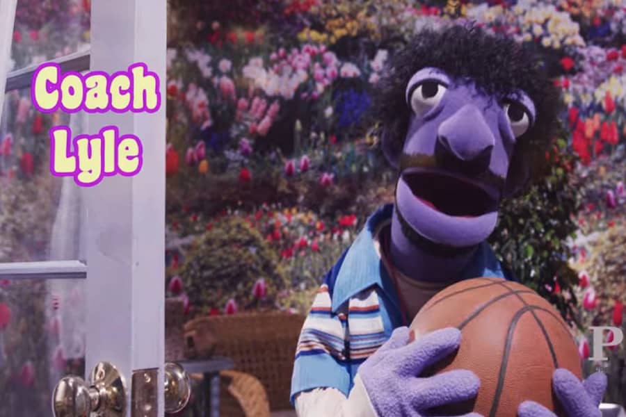 Coach Lyle, a purple puppet