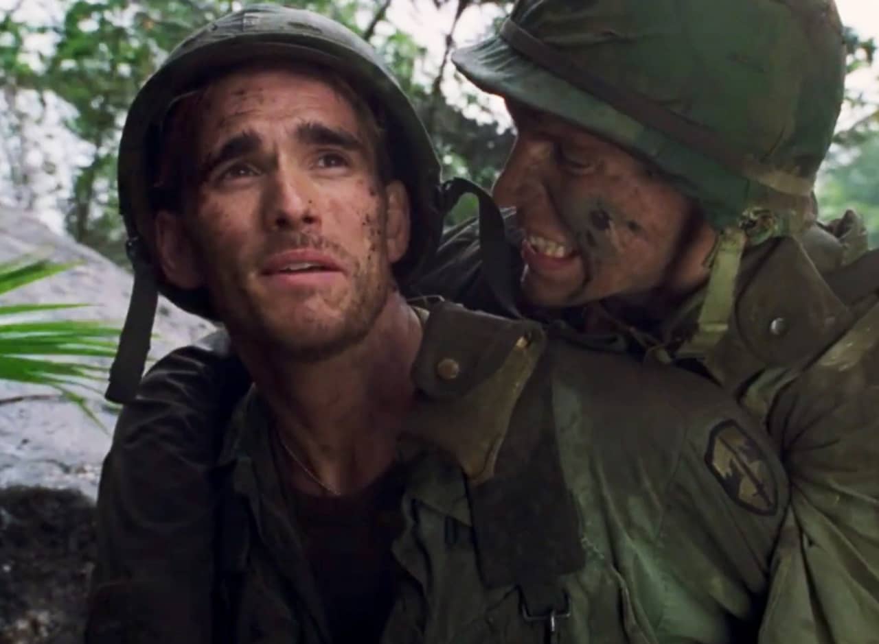 Lieutenant Billy Stevens carrying an injured soldier, Danny, on his back