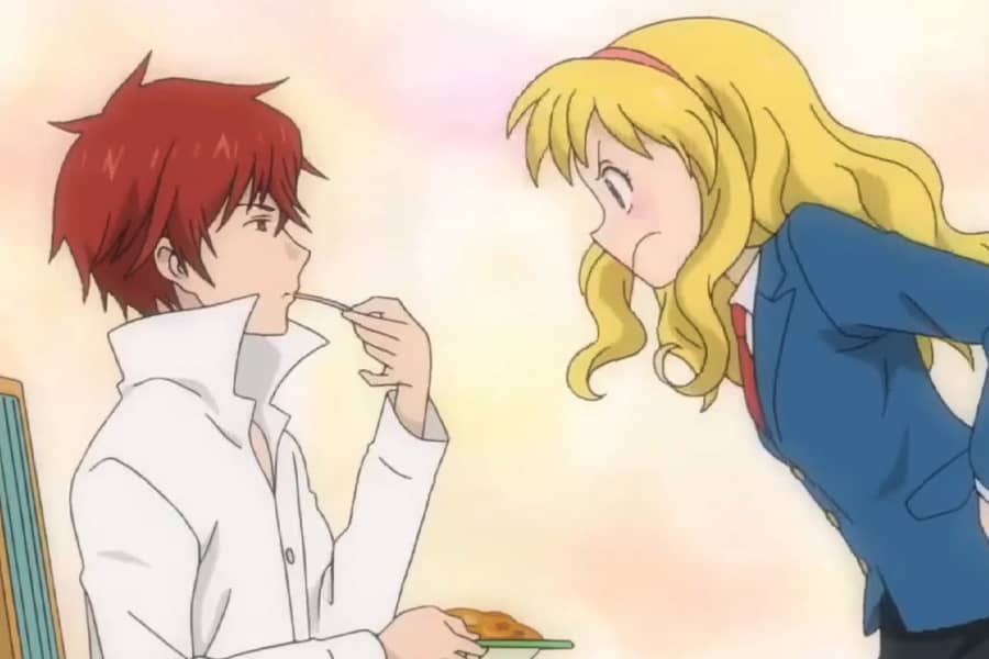 Kyunko speaking to Ikeo as he eats