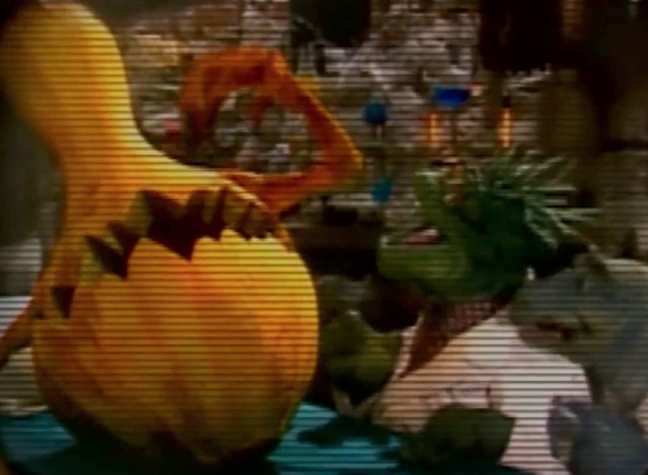 Dr. Fiend, Igor, and a giant squash with arms and a mouth