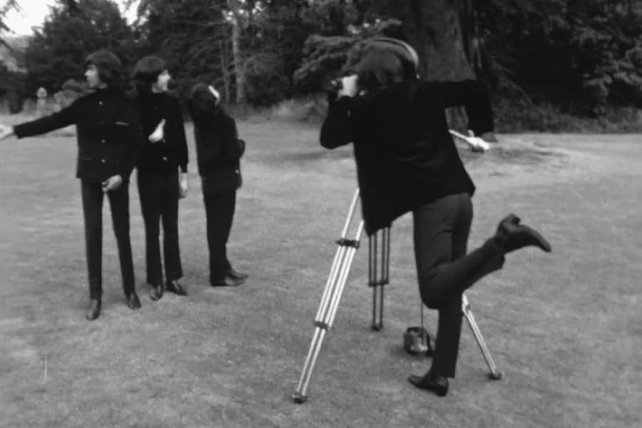 The Rutles having a photo taken in the park