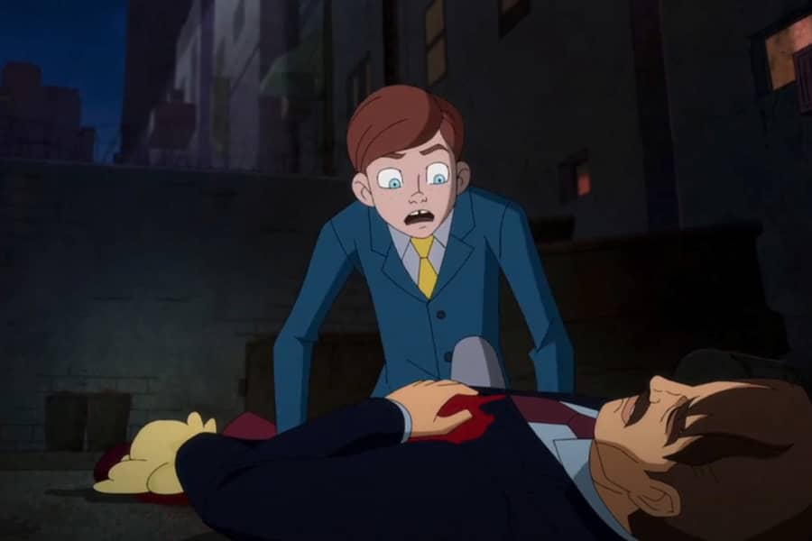 Bruce kneels over his father’s body