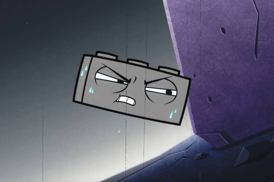 Rick pushing against a large stone object