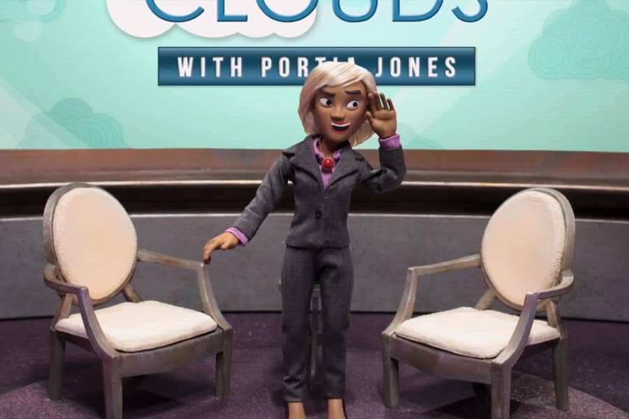 Portia with her hand up to her ear