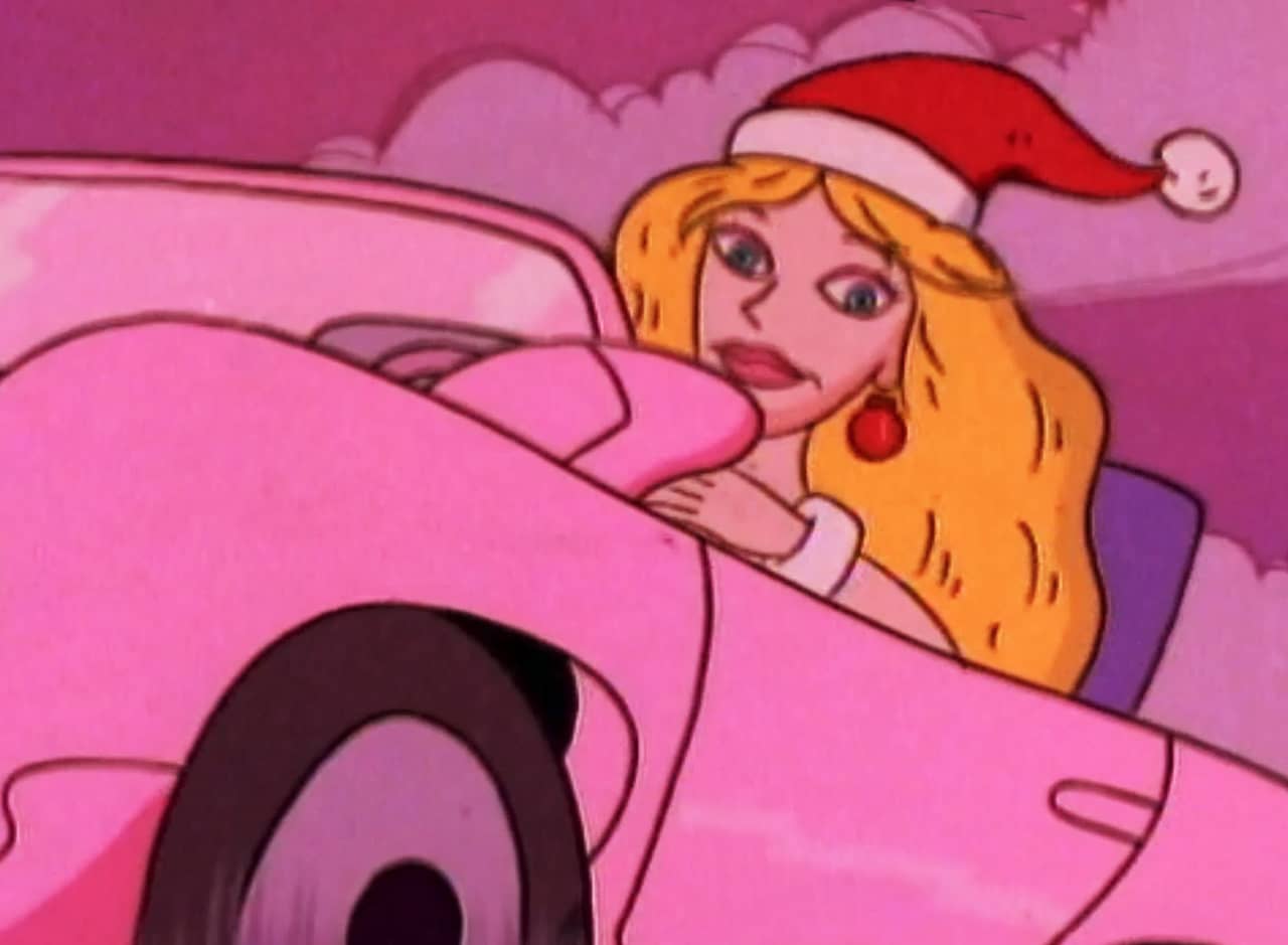 Cynthia in a Santa hat driving a pink covertible