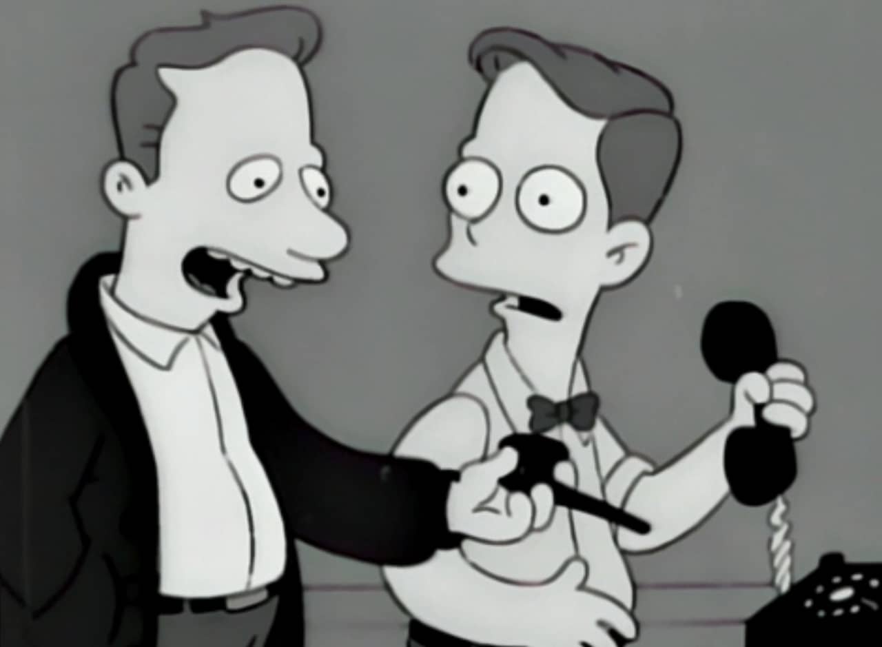 host holding a pipe and talking to Jimmy who is holding a landline phone