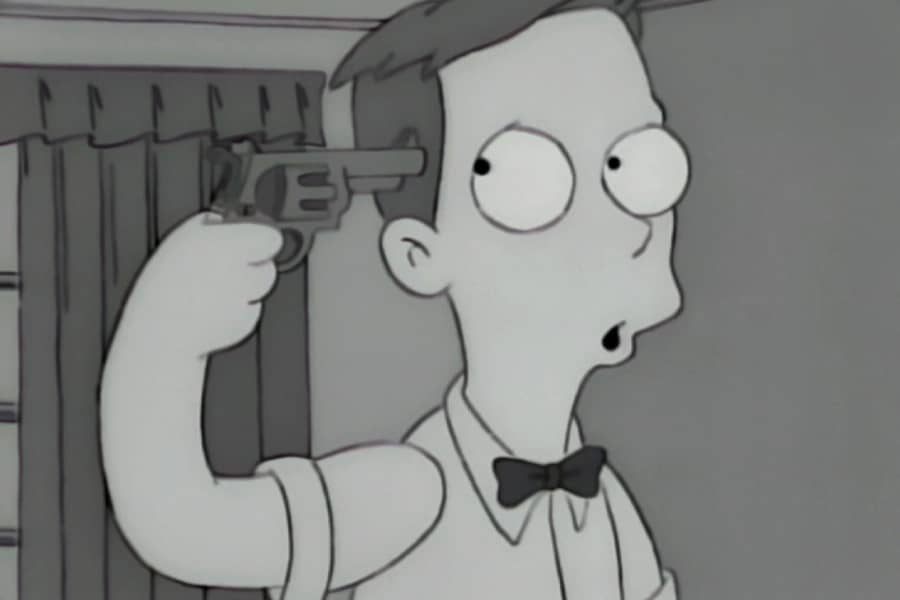 Jimmy pointing a gun at his head