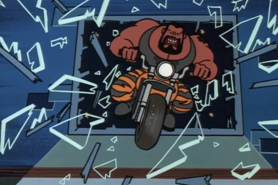 Action Hank riding a motorcycle through a window