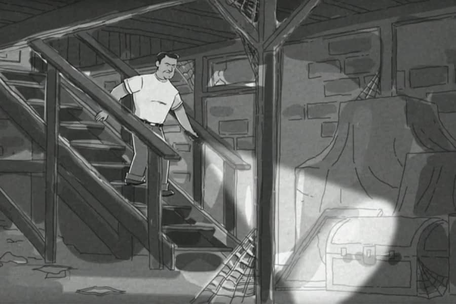 man walking down basement stairs with a flashlight