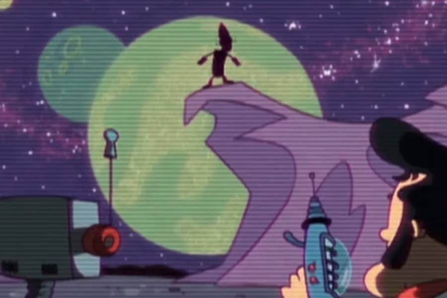 Looking up at a figure on a mountain edge