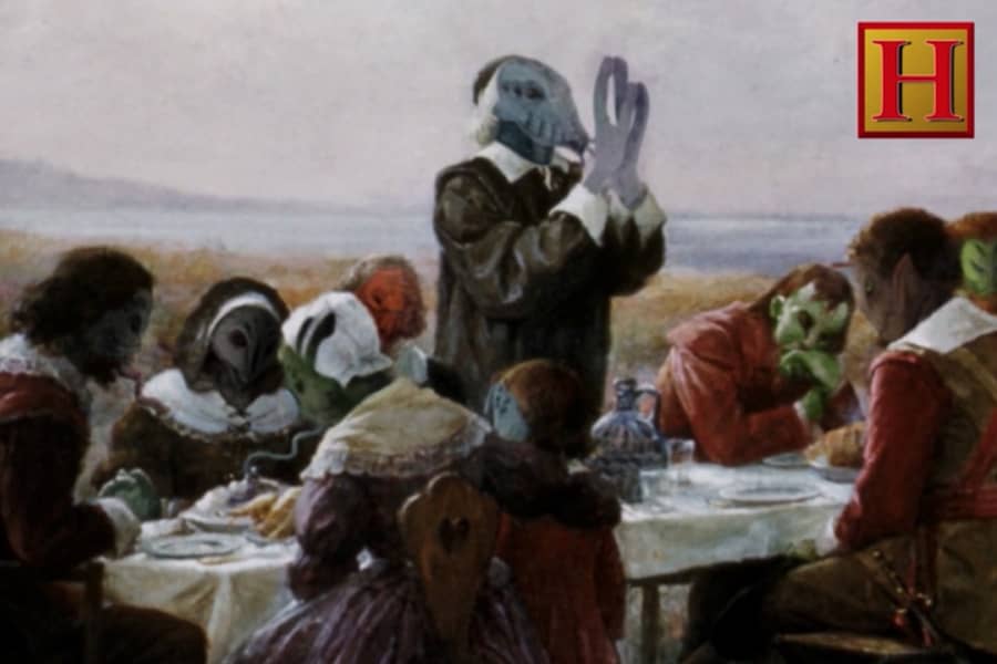 a Thanksgiving table but everyone is an alien