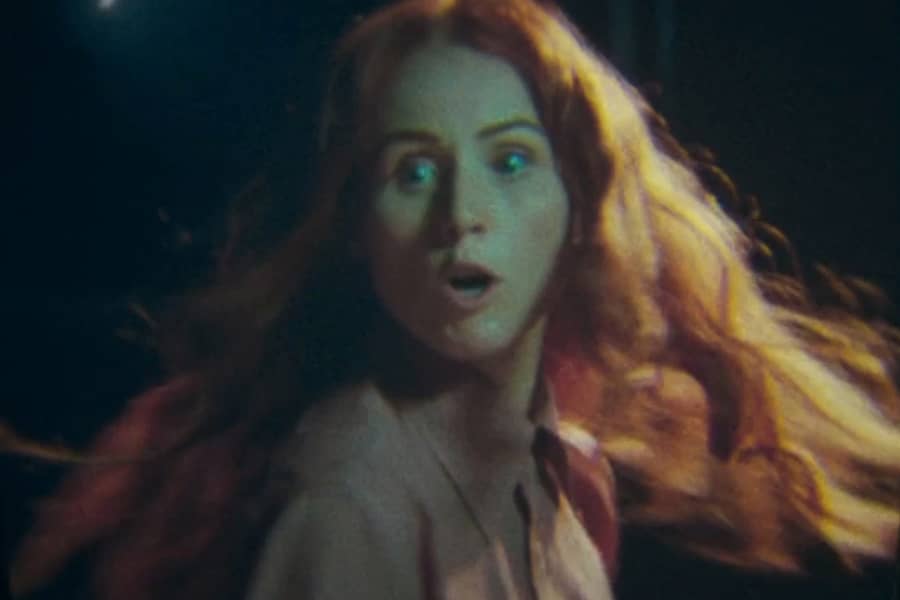 woman spinning around in fear