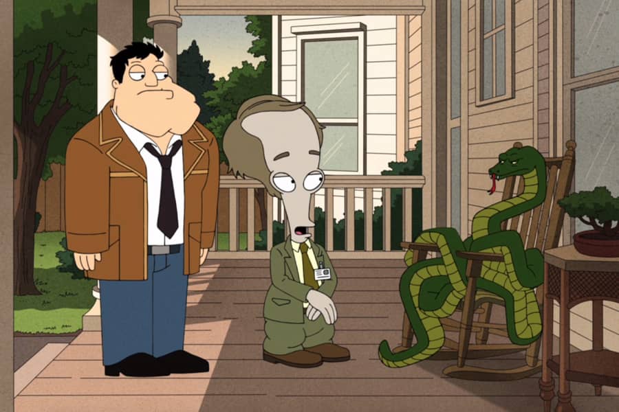 the Stans talking to a snake sitting in a rocking chair