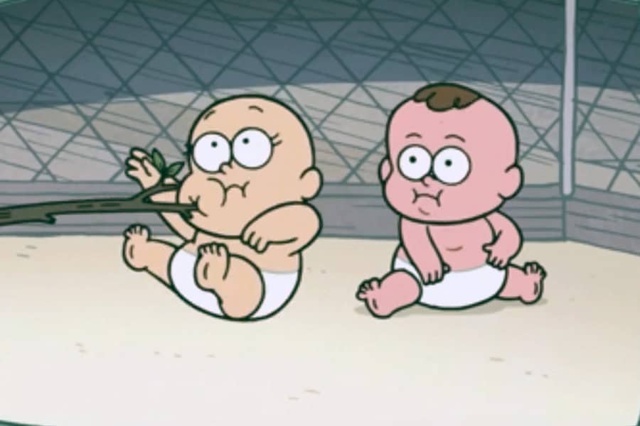 one baby is poked with a stick