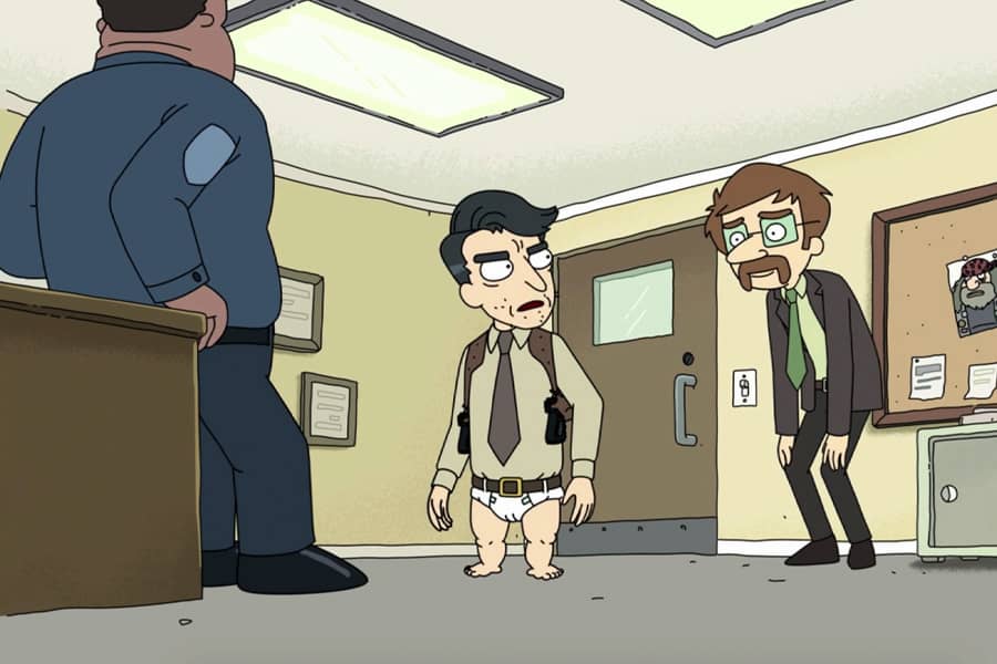 another detective, Regular Legs, crouches to speak to Baby Legs