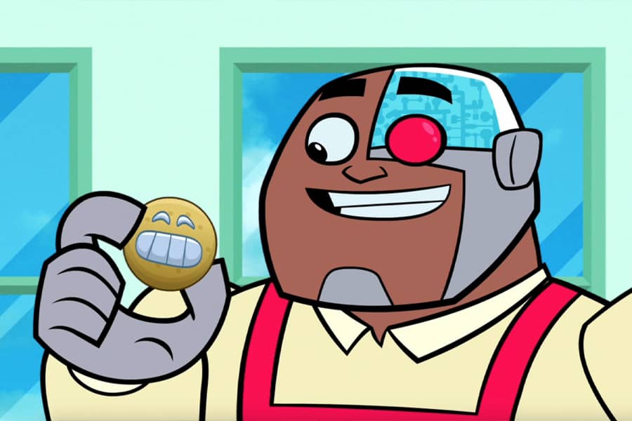 Cyborg holding an emoji cookie