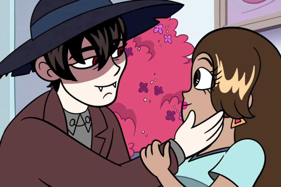 vampire puts his hand on the pop stars face