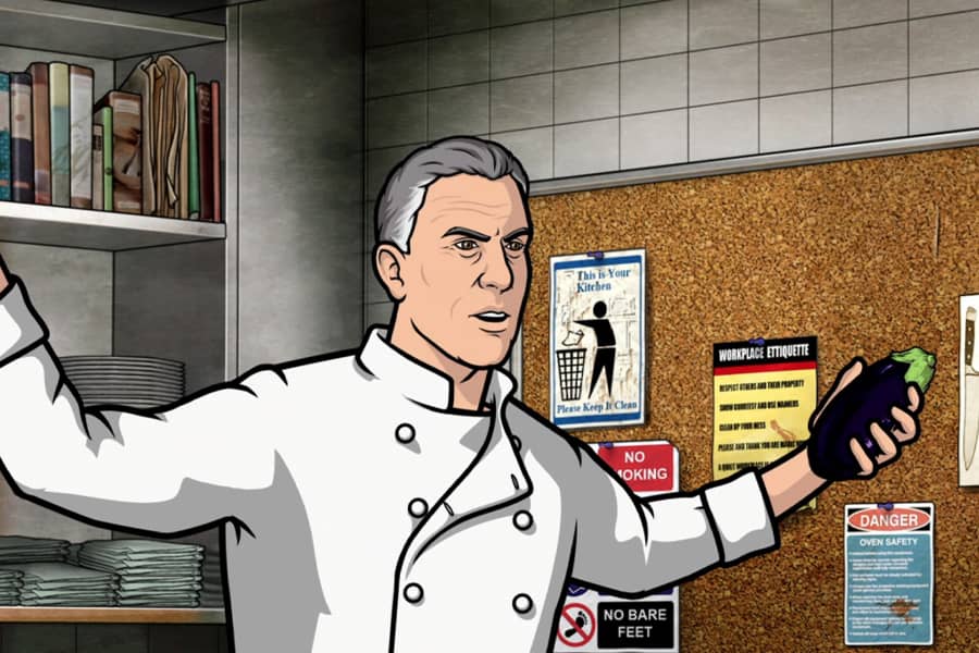 Casteau yelling and waving around an eggplant