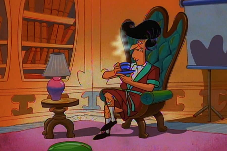 Licking drinking tea in his armchair and smoking jacket