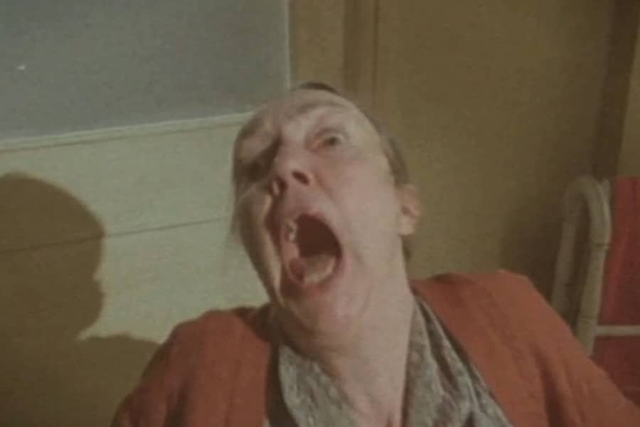 elderly woman screaming