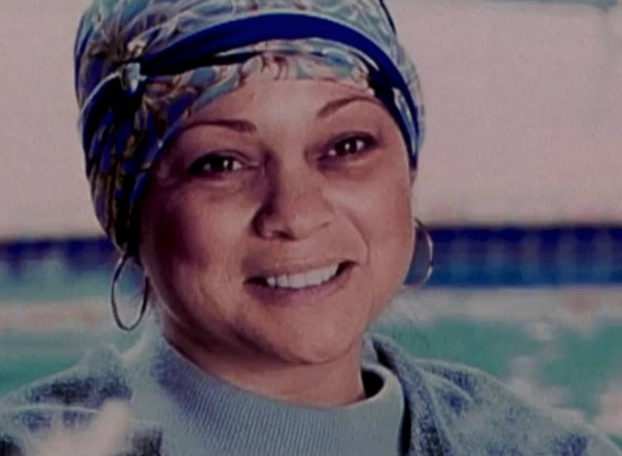 Valerie Bertinelli with dark circles under her eyes and wearing a headscarf