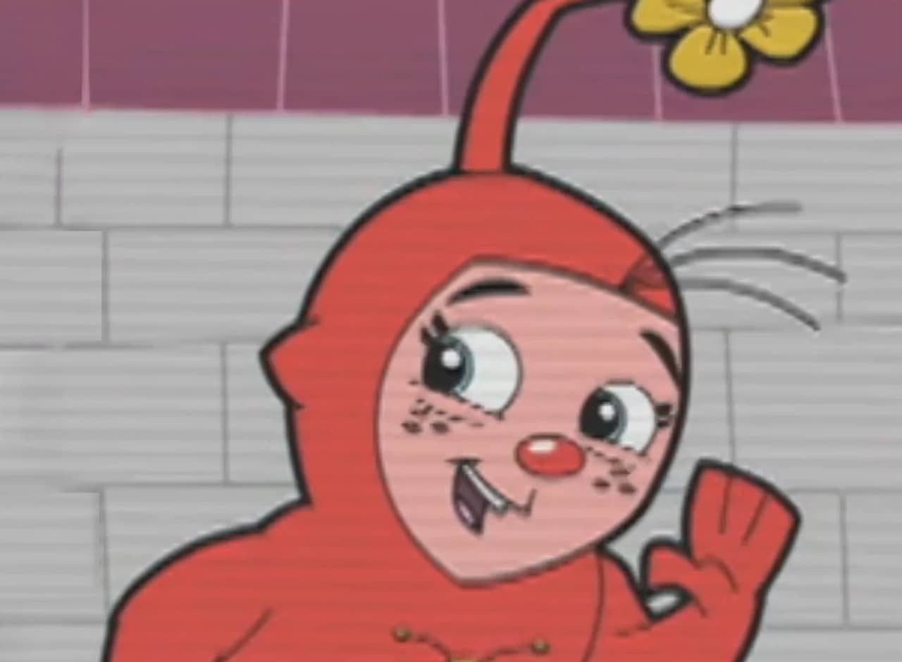 little freckled guy in a red bodysuit with flower extending from their head