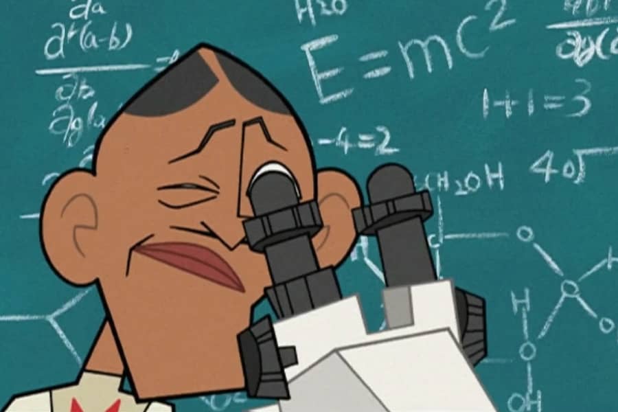 Leon looking into a microscope with calculations on a blackboard behind him