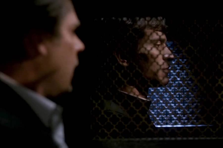 man in the confessional and Sean Walker is on the other side