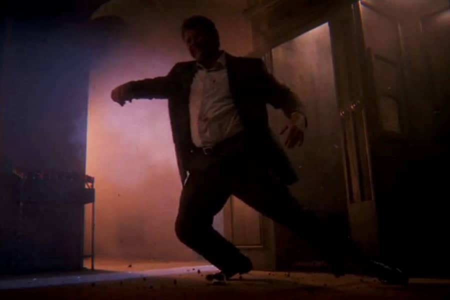 man falling down after being shot