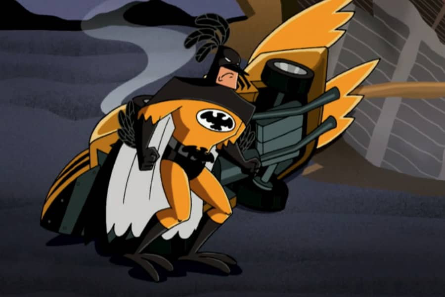 Blackbird next to his car which is crashed and smoking