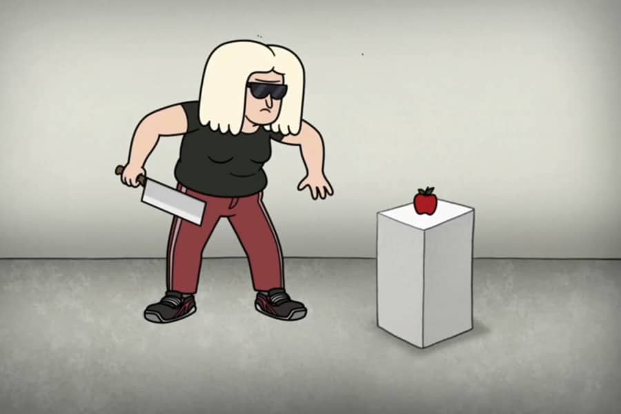 Tank le’Slice, knife in hand, approaching an apple on a pedestal