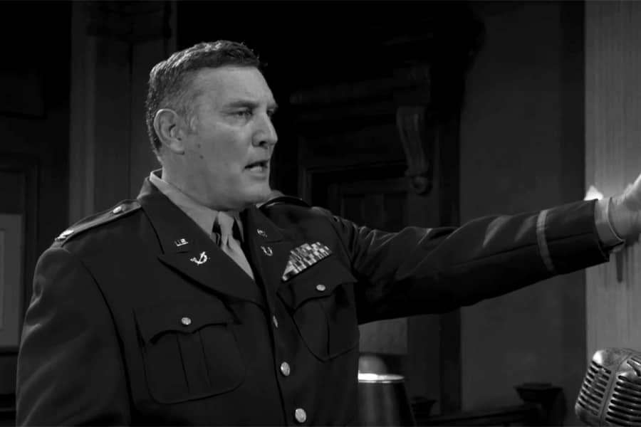 a U.S. General speaks to the courtroom