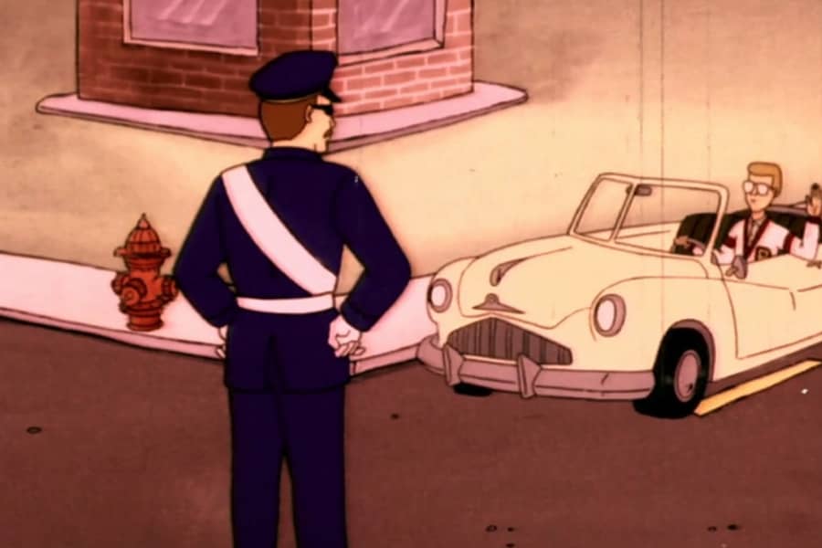 car at an intersection where a cop is standing