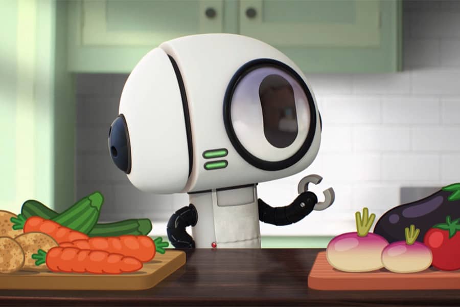 Bobert with cutting boards of vegetables