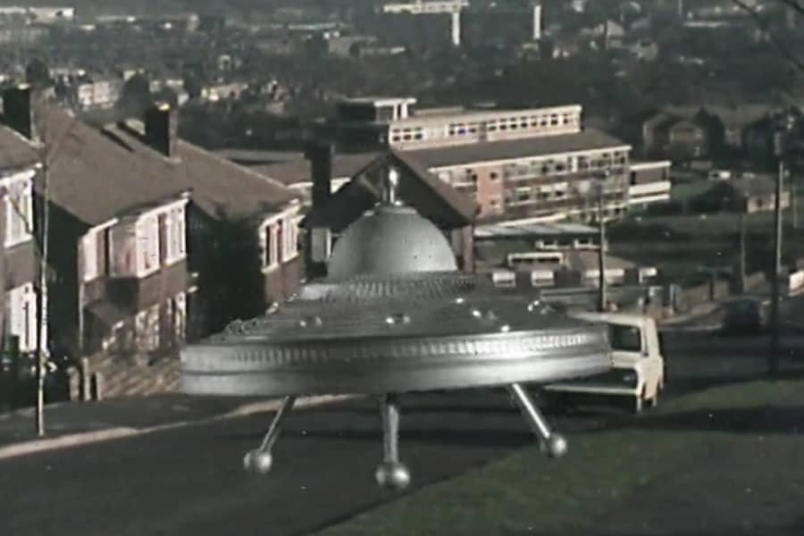 a UFO lands in a neighborhood