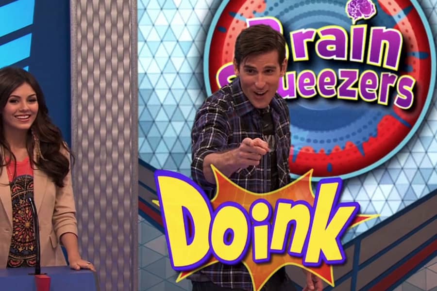 the host pointing and a graphic says “Doink!”