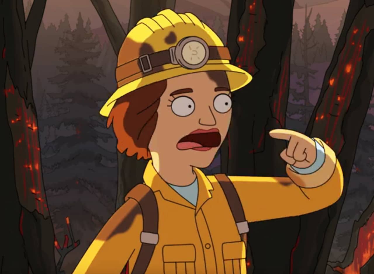 Reese as Carol Smoke in the middle of a forest fire