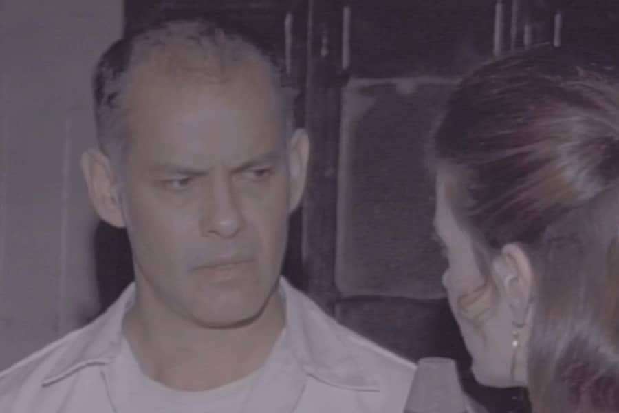 Winters speaks with a sanitarium employee