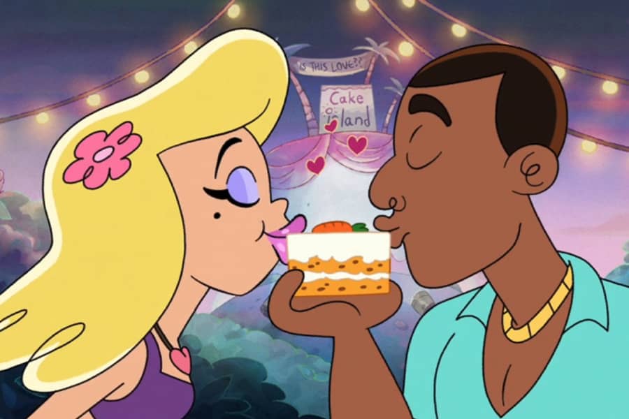 man and woman kiss a slice of cake