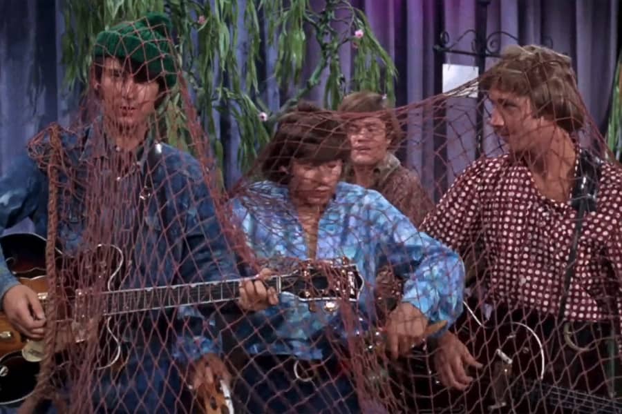 The Monkees trapped under a fishing net