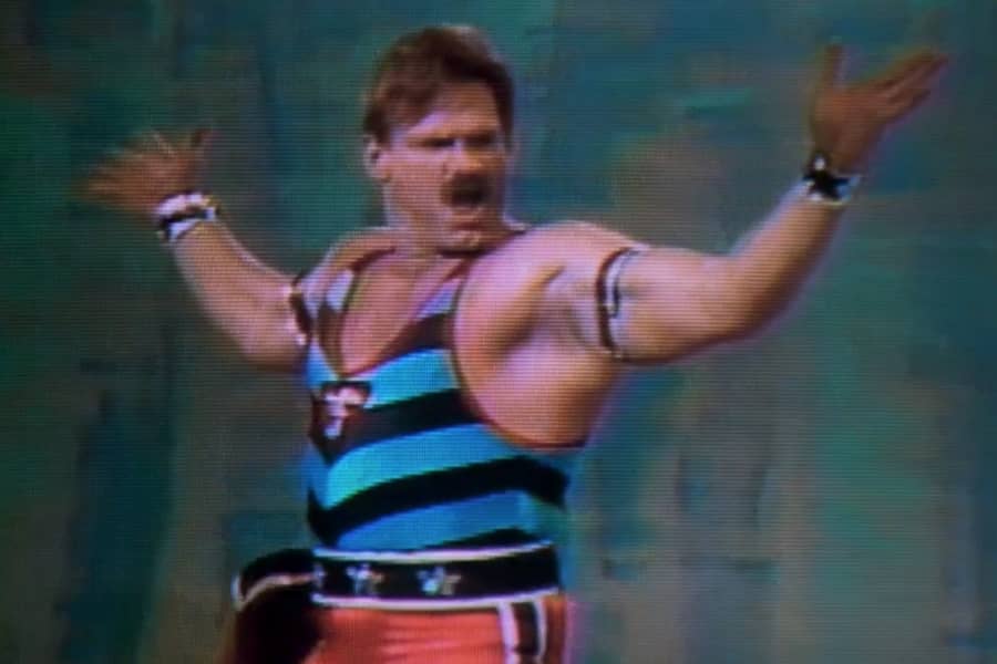 Captain Freedom with his arms up